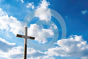 empty wooden cross against a beautiful sky