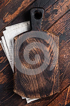 Empty wooden Cutting board over towel on kitchen table, healthy cooking background. Wooden background. Top view. Copy