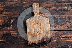 Empty wooden Cutting board over towel on kitchen table, healthy cooking background. Wooden background. Top view. Copy