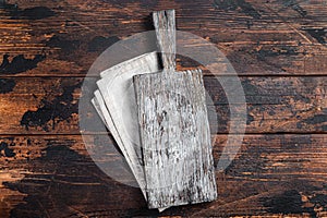 Empty wooden Cutting board over towel on kitchen table, healthy cooking background. Wooden background. Top view. Copy