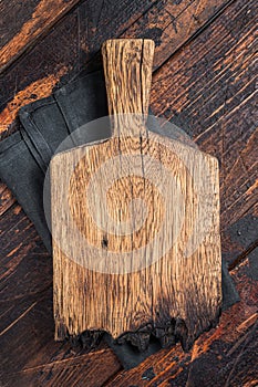 Empty wooden Cutting board over towel on kitchen table, healthy cooking background. Wooden background. Top view. Copy