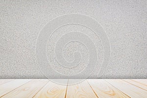 Empty wooden deck table over surface marble stone pattern seamless terrazzo at the wall background for present product