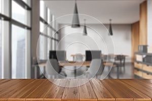 Empty wooden desk and office room interior with furniture and window, mockup