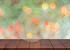 Empty wooden floor. blurred colorful bokeh light background