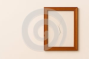 An empty wooden frame with a crack inside. Space for text.