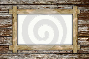 Empty wooden frame, hanging on wood