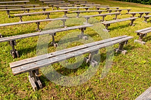 Empty wooden outdoor benches for spectators