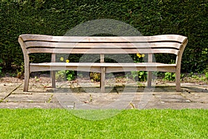 Empty wooden park bench