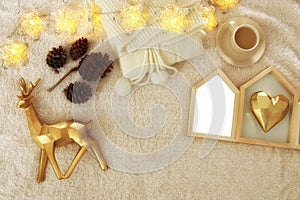 Empty wooden photo frame over cozy and warm fur carpet. For photography montage. Top view.