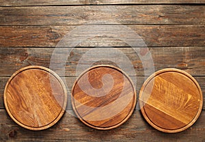 Empty wooden pizza plates with copy space