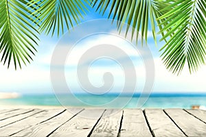 Empty wooden planks with beach, palms. Background for product, content placement