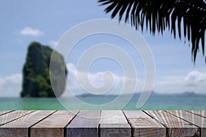 Empty wooden planks with blur beach on background, can be used for product placement