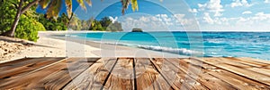 Empty wooden planks table against a blurred background with a sea coast with palm trees during the day, banner