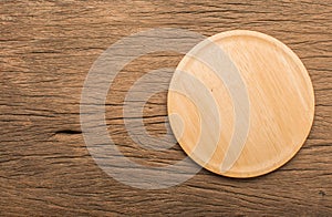 Empty wooden plate  wood texture background can use to pizza on plate and copy space etc