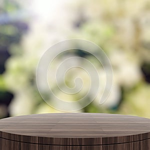 Empty wooden round table and blurred background