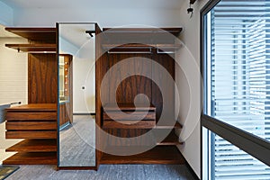 Empty wooden shelf and cabinet and bathroom, interior design