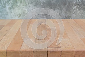 Empty wooden shelf with concrete background. For display your products