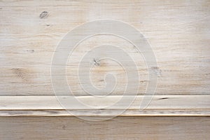 Empty wooden shelf on wood texture background