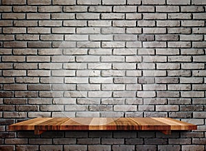 Empty wooden shelfs on pastel grunge brick wall, Mock up template for display of product
