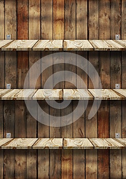 Empty wooden shelves on wall