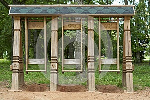 Empty wooden swing in Park. Ban on walking due to threat of coronavirus photo