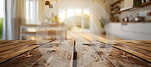 Empty wooden table against kitchen bench background with beautifully blurred artistic effect