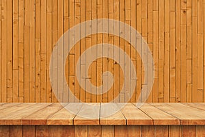 Empty wooden table and bamboe wall background