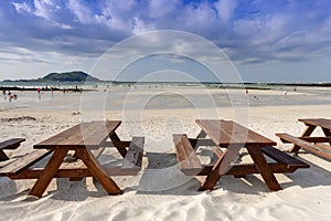 Empty wooden table on the beach