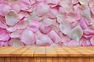 Empty wooden table and beautifull flower wall background