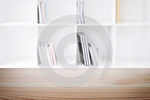 Empty wooden table and blur background of abstract in front of m