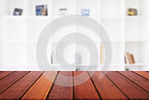 Empty wooden table and blur background of abstract in front of m