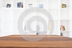 Empty wooden table and blur background of abstract in front of m