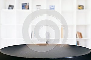 Empty wooden table and blur background of abstract in front of m