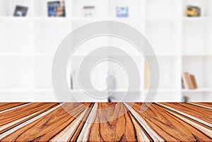 Empty wooden table and blur background of abstract in front of m