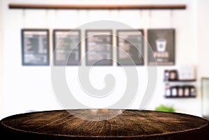 Empty wooden table and blur background of abstract in front of r