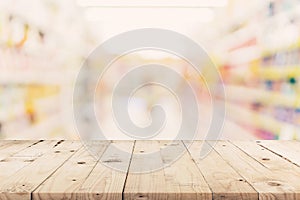 Empty wooden table and Blurred background - Store of shopping ma