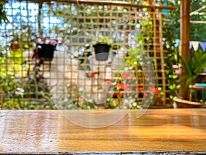 Empty wooden table and blurred   garden background