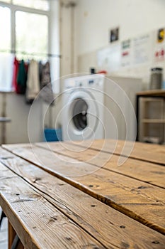 Empty Wooden Table in Blurred Laundry Room with Washing Machine
