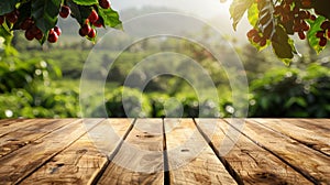 empty wooden table with coffee plantation and ripe red coffee beans as background