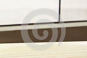 empty Wooden table and de focused window background