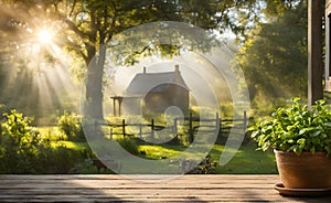 An empty wooden table in the foreground, with a blurred country house in the background against a verdant garden setting