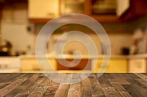 Empty wooden table with kitchen bokeh