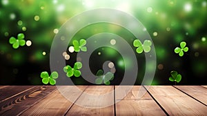 Empty wooden table mockup with defocused green and gold background, shamrock