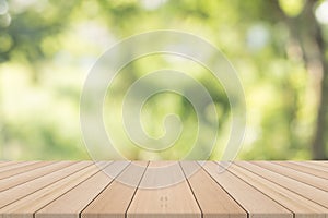 Empty wooden table with natural background