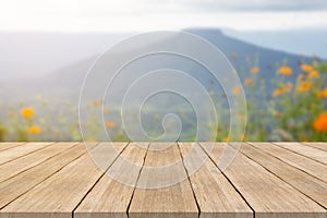 Empty wooden table top on blurred background at mountian