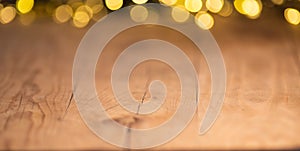 empty wooden table top with blurred light gold bokeh abstract background. For montage product display or design key visual layout