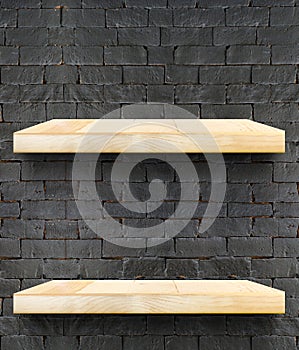 Empty Wooden Table top and shelf at black bricks wall,Template m