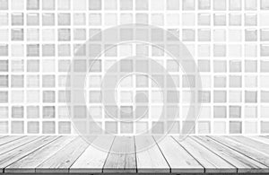 Empty wooden table top on white ceramic tile wall background, Design wood terrace white. Perspective for show space for your copy