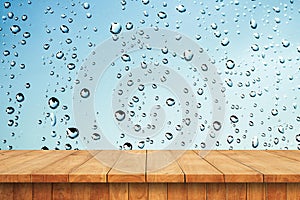 Empty wooden table and water drop