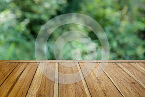Empty Wooden table for your product and blur natural background
